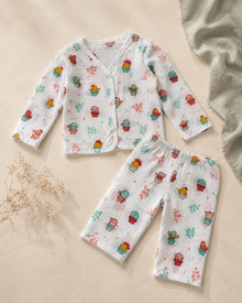 Maison Joey cactus-print muslin night suit on a warm ivory editorial background