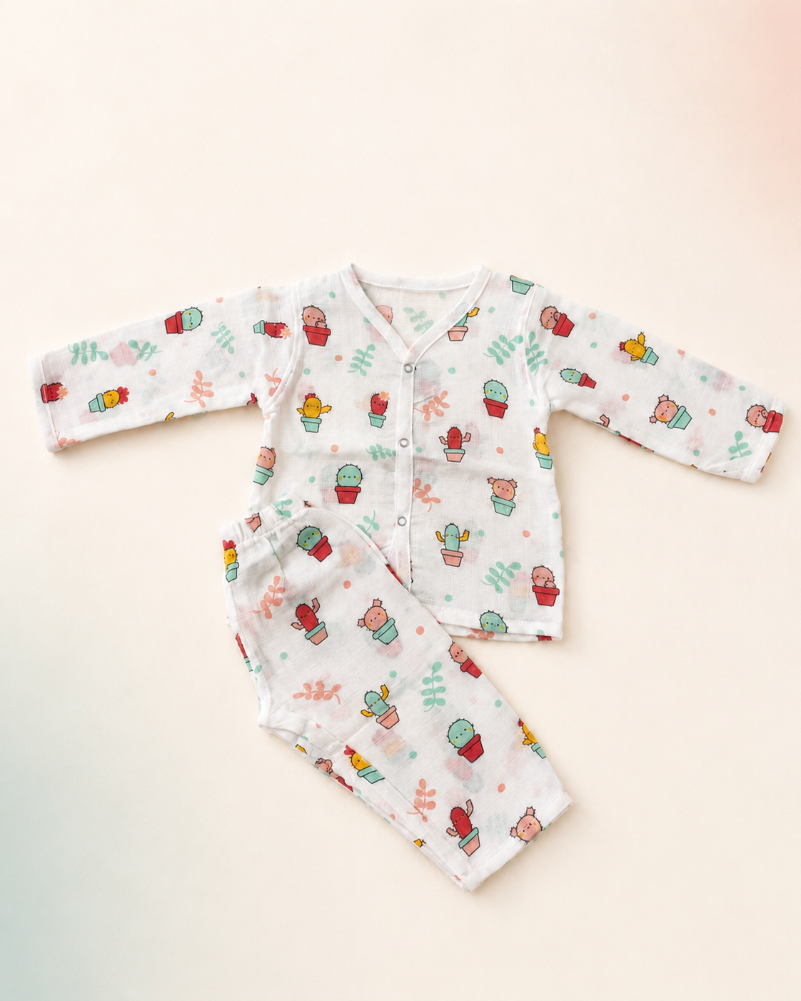 Maison Joey cactus-print muslin night suit on a seamless warm ivory studio background