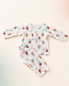Maison Joey cactus-print muslin night suit on a seamless warm ivory studio background